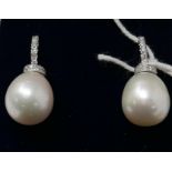 A boxed pair of 18ct white gold, white pearl and brilliant cut diamond studded drop earrings, 2.5
