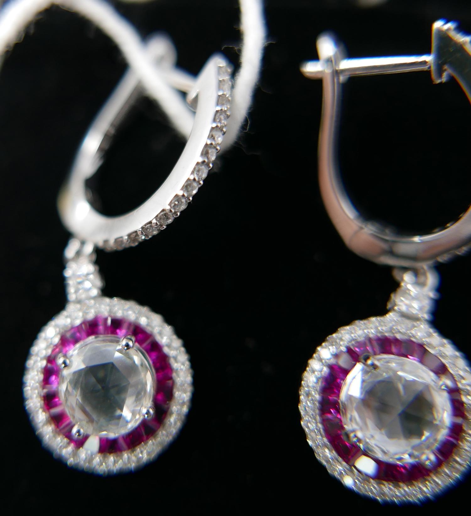 A boxed pair of 18ct white gold, ruby and diamond drop earrings, each earring set with a central - Image 4 of 4