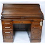 An Edwardian oak roll top desk, H.113 W.122 D.76cm