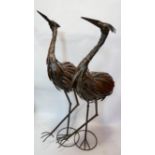 A pair of sheet metal herons, H.130cm