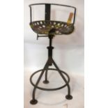 A 20th century industrial adjustable stool