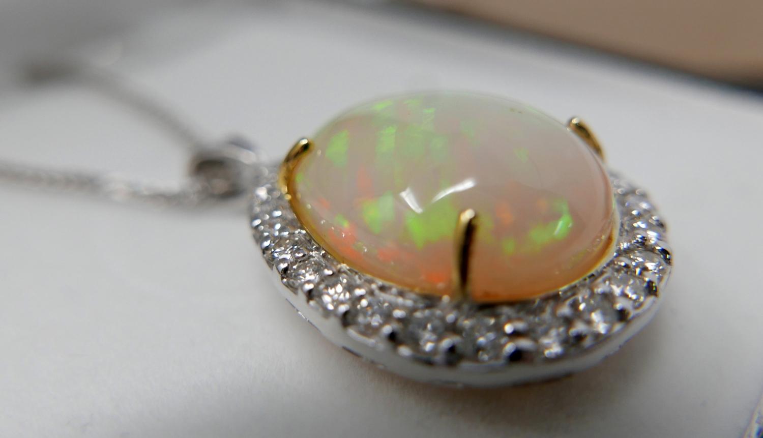 A boxed, 18ct white gold, diamond and pear-shaped opal pendant on an 18ct white gold chain, Pendant: - Image 2 of 3