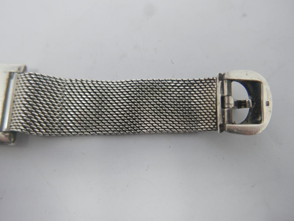 WITHDRAWN- A 1970's Roy King silver wristwatch, square textured dial signed, the textured silver - Image 5 of 7