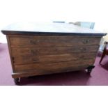 A large 20th century pine double sided plan chest, with eight drawers, raised on turned legs and