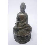 A bronze figure of a seated Buddha. H.18cm