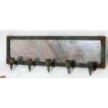 An antiqued mirror with candle holders, H.25 W.88 D.14cm