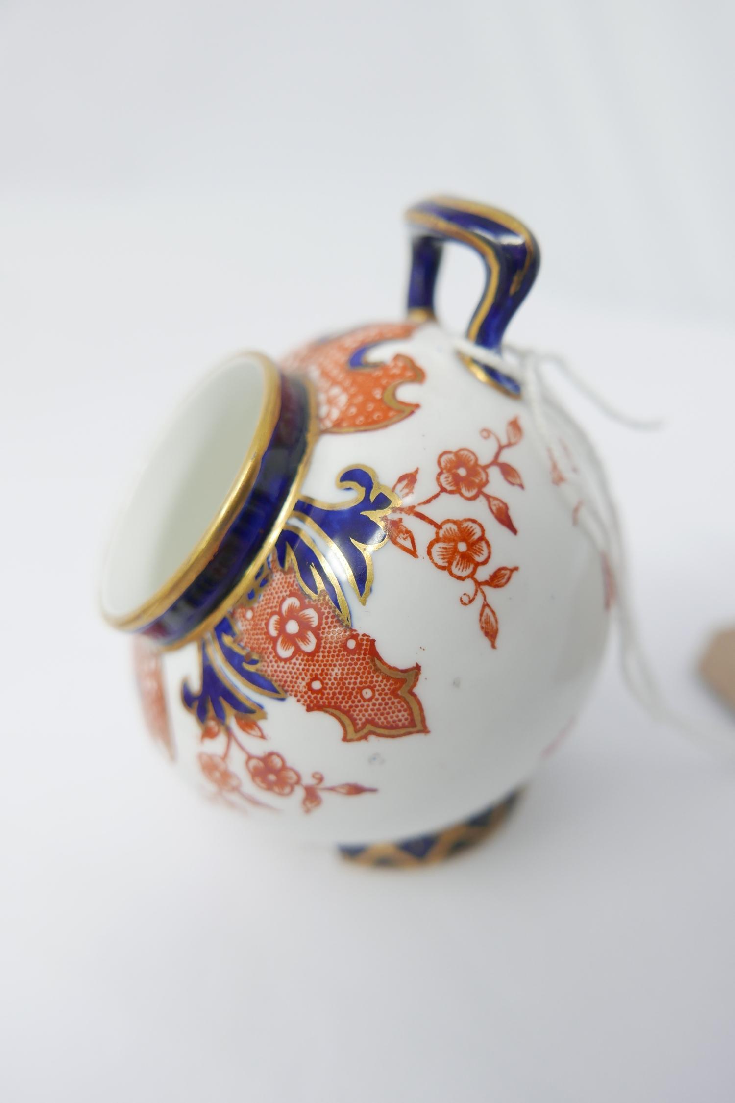 A set of six Royal Crown Derby coffee cups and saucers together with two small vases and a pot - Image 5 of 5