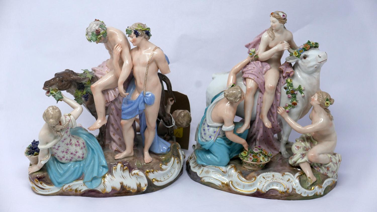 A pair of 19th century Meissen porcelain figural groups, H.21cm (both have some damage)