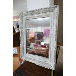 A 19th century distressed painted wall mirror. H.74 W.56cm