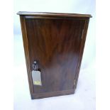 A walnut side cabinet, H.62 W.39 D.35cm