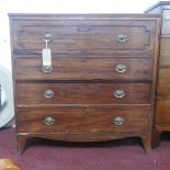 A Regency mahogany secretaire chest, the fully fitted pull out desk above three drawers, raised on