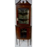 An Edwardian mahogany corner display cabinet, with marquetry inlay, raised on tapered legs, H.207