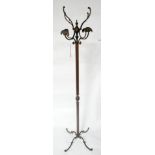 An early 20th century brass hat and coat stand