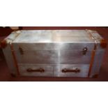 An Andrew Martin style aviator trunk, with hinge lid over two drawers, H.50 W.110 D.40cm