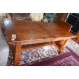 A French oak dining table with extra leaf, H.75 W.228 D.95cm