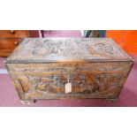 A 20th century Chinese carved hardwood trunk, with camphor wood lining, H.55 W.102 D.50cm