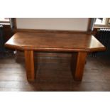 An Art Deco burr walnut dining table raised on twin pedestals, H = 75cm W = 155cm D = 79cm