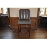 A grey leather upholstered high chair or bar stool, H = 121cm W = 54cm D = 47cm