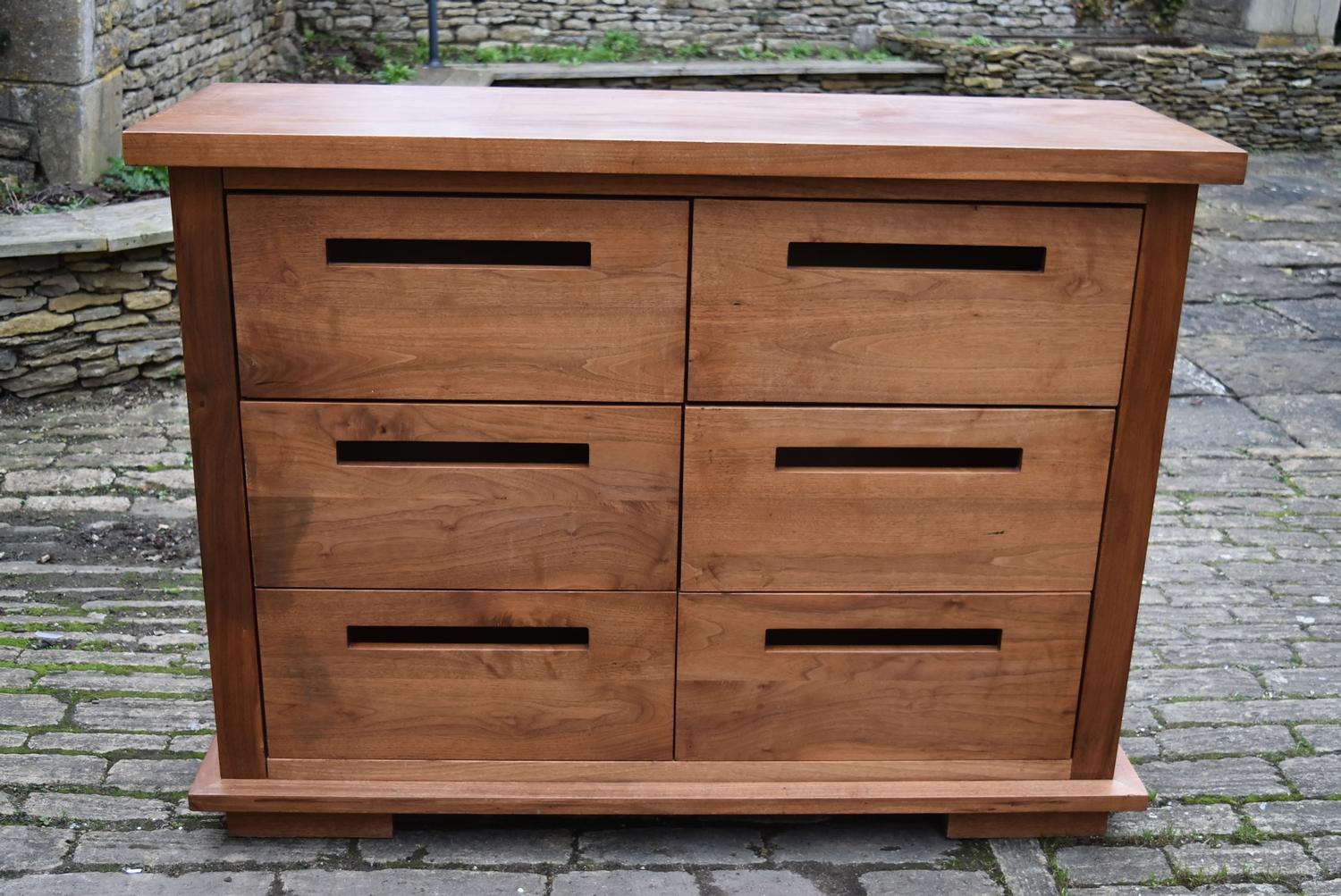 A 20th century teak chest of 6 drawers, H = 110cm x W = 148cm D = 50cm