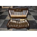 A mid 20th century 52 piece complete canteen of silver plated cutlery in its fitted box, H = 9cm W =