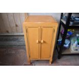 A 20th century distressed painted bedside cabinet, H = 77cm W = 42cm D = 36cm