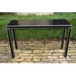 A black perspex console table, H = 77cm W = 122cm D = 39cm