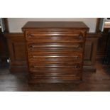 A continental oak 5 drawer chest. H = 97cm W = 91cm D = 42cm
