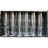 A boxed set of six, Mario Cioni, Italian, champagne flutes with 3 bobble stem. H: 21cm, Engraved