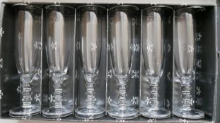 A boxed set of six, Mario Cioni, Italian, champagne flutes with 3 bobble stem. H: 21cm, Engraved