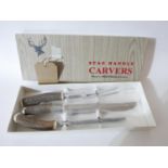 A brand-new and boxed, Stag-horn and stainless steel 3-piece carving set. RRP: £200