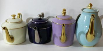 4 Legle Limoges, porcelain teapots in tuquoise H: 22cm, lilac H: 17cm, navy H: 14.5cm, cream H: 14.