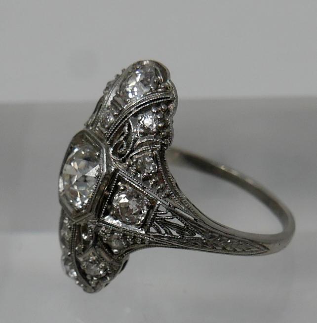 An 18ct white gold, Art Deco ring set with a large brilliant-cut diamond radiating to a further 8 - Image 6 of 7