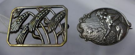 Two silver brooches to include an Art Nouveau oval-shaped example 2.3 x 3.3cm and a rectangular