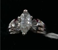 A 14ct white gold diamond solitaire ring, centrally set with a marquise-cut diamond (1.25 carats) to