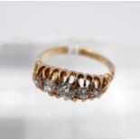 An 18ct yellow gold, 19th century, graduated 5-stone diamond ring, multi-claw setting to carved