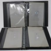 Two folios containing 70 hand-drawn and hand-painted jewellery designs each on tracing paper