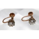 A pair of 18ct yellow gold, Victorian, diamond solitaire earrings with screback fittings, Diamond