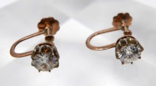 A pair of 18ct yellow gold, Victorian, diamond solitaire earrings with screback fittings, Diamond