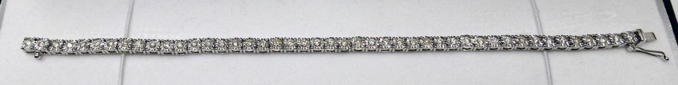 A boxed, 18ct white gold, diamond tennis bracelet set with 45 round brilliant cut diamonds, (2.00