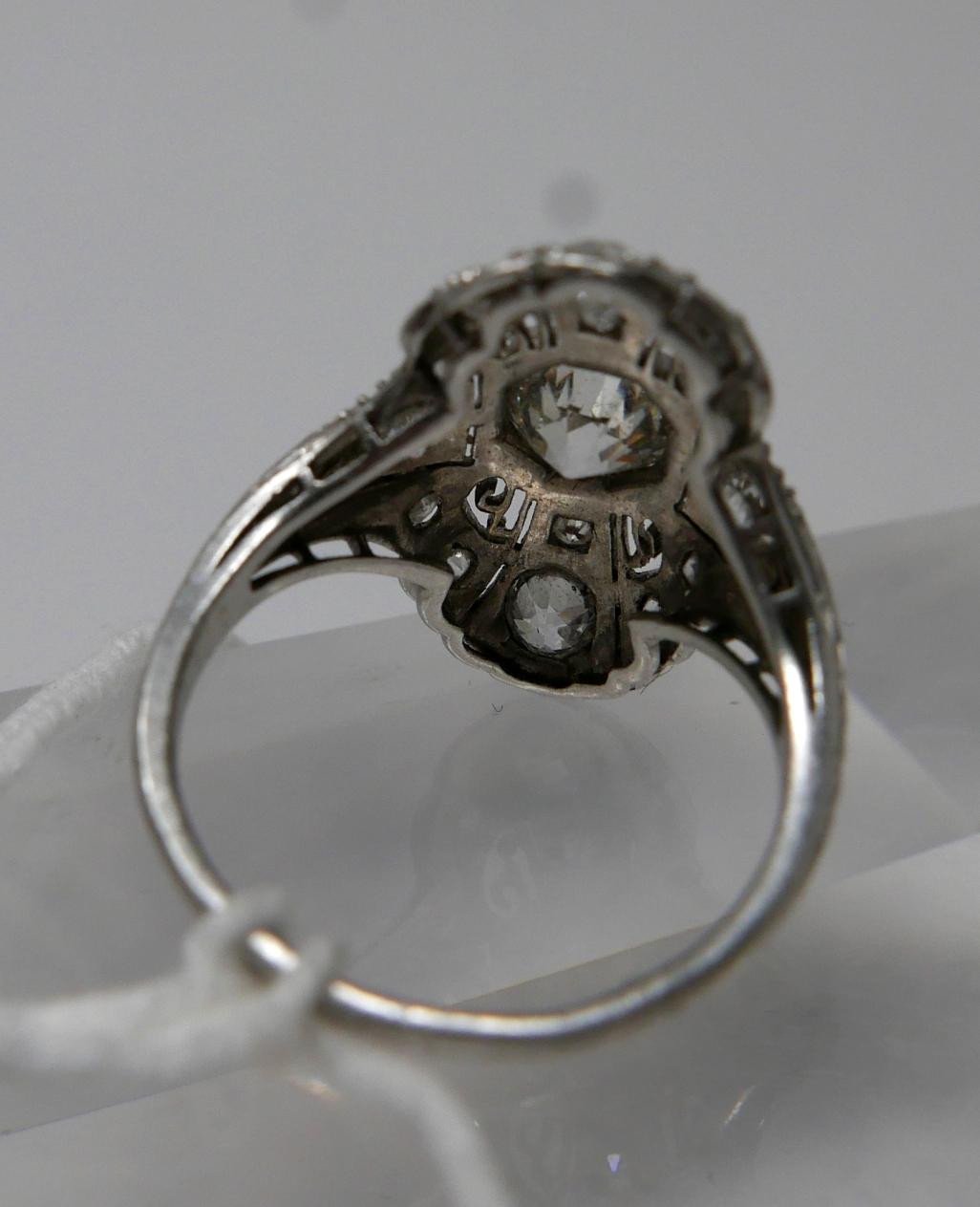 An 18ct white gold, Art Deco ring set with a large brilliant-cut diamond radiating to a further 8 - Image 4 of 7