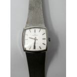 A Gentleman's Josmar, stainless steel watch, with a square shaped, silvered dial and bar numerals,