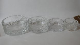 Four, weighty hand-cut crystal ashtrays in various sizes by Cristallerie de Montbrom, Paris, Dias: