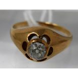 An 18ct yellow gold, Victorian, diamond solitaire ring, centrally set with a cushion-cut diamond