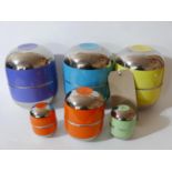 A collection of 6 Legle Limoges, porcelain lidded boxes large and small in bright colours and