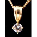 A boxed, 18ct yellow gold, diamond solitaire pendant on an 18ct yellow gold chain, (0.30 carats),