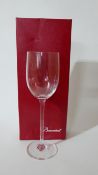 8 Baccarat plain wine glasses (Individually Boxed) H: 21.5cm, Engraved 'Baccarat' to each foot.