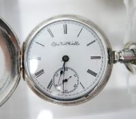 An Elgin USA full hunter pocket watch, the white enamel dial with Roman numerals and seconds