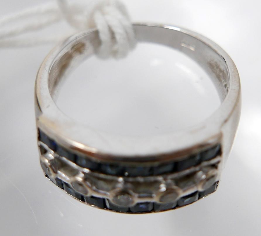 A large, 18ct white gold Art Deco style diamond and sapphire ring, set centrally with five, round, - Image 2 of 2