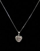 A boxed 9ct white gold and pave-set diaond heart-shaped pendant on 9ct white gold chain, L: 35cm,