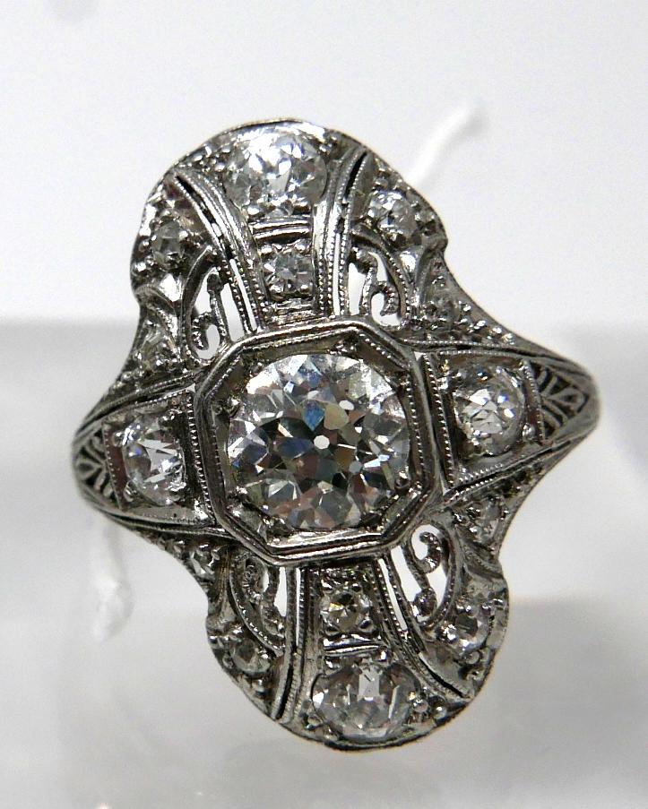 An 18ct white gold, Art Deco ring set with a large brilliant-cut diamond radiating to a further 8 - Image 2 of 7